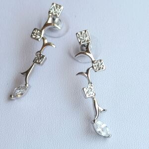 Long 925 real silver earrings with branch design with round zirconia stones like
